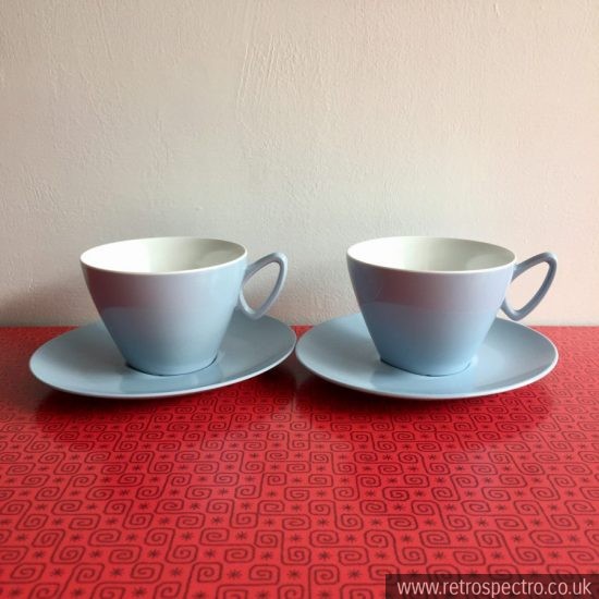 Light blue melamine cups and saucers.