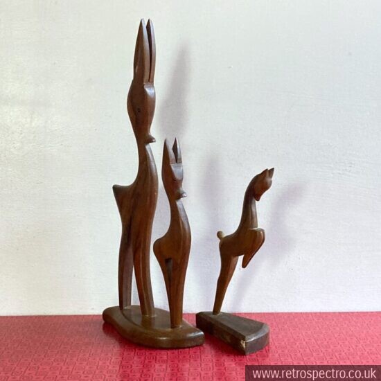 vintage hand carved stylized deer figurine